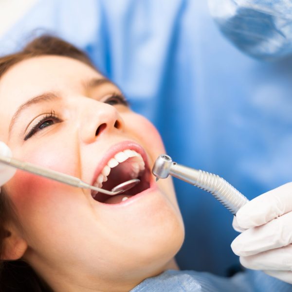 Woman receiving a dental treatment